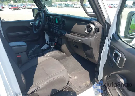 2023 Jeep Wrangler 4-Door Sport S 4X4 z USA, uszkodzony, nr VIN 1C4HJXDN5PW681679